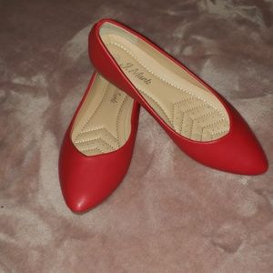 Red pointed toe flats